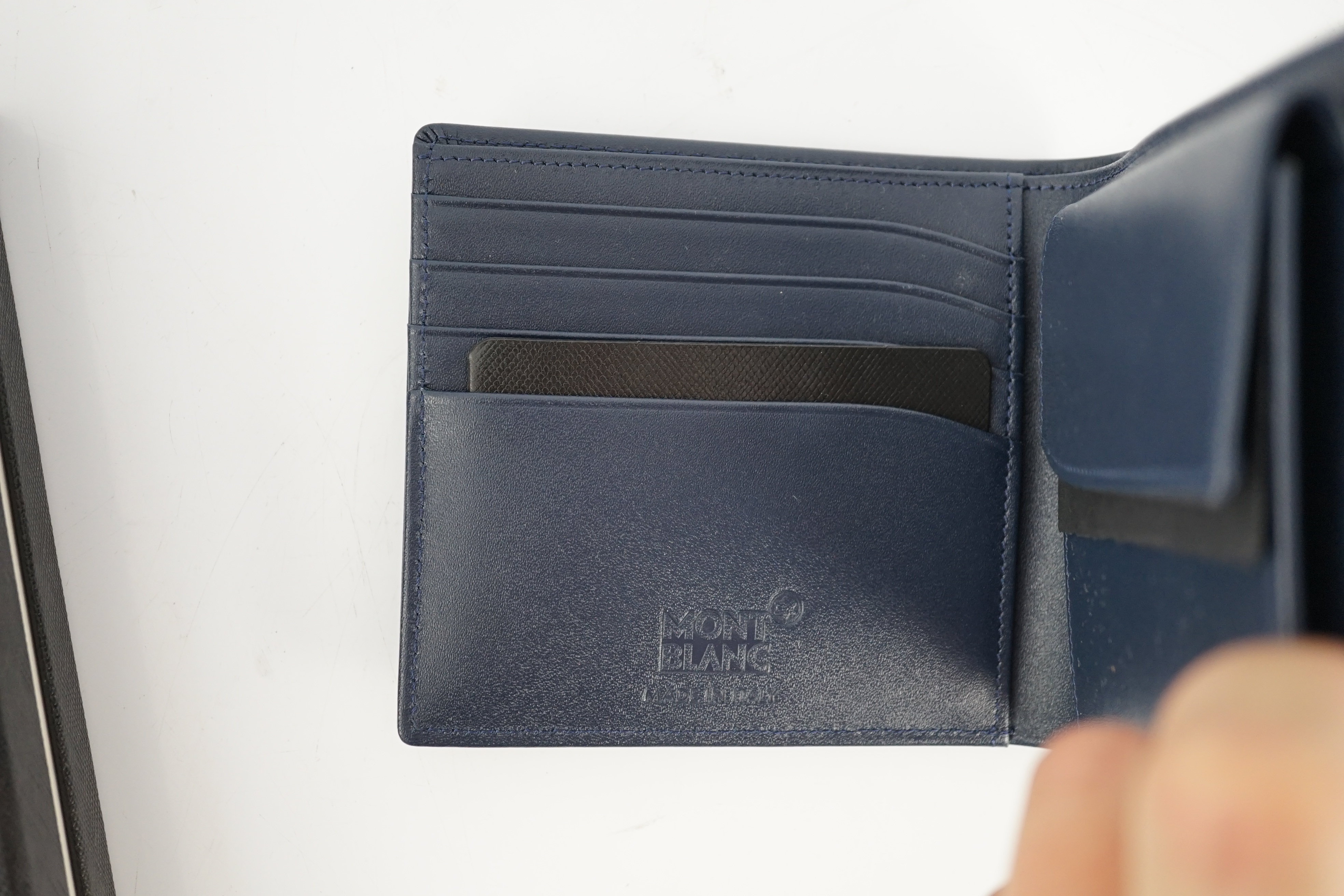 A Mont Blanc Meisterstuck 4cc navy leather wallet width 9.5cm, height 11cm